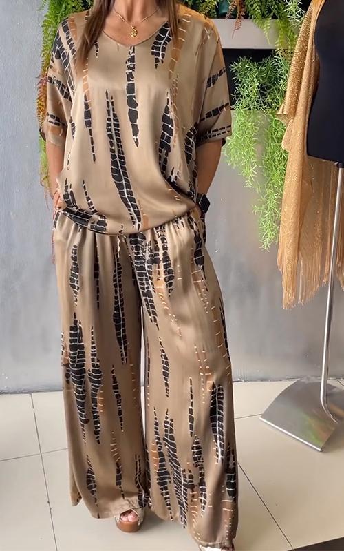 Chic en vloeiend satijnen tweedelige set voor vrouwen met moeiteloze charme en stijl | Yfke